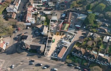 Former Builders Merchants & Car Showroom